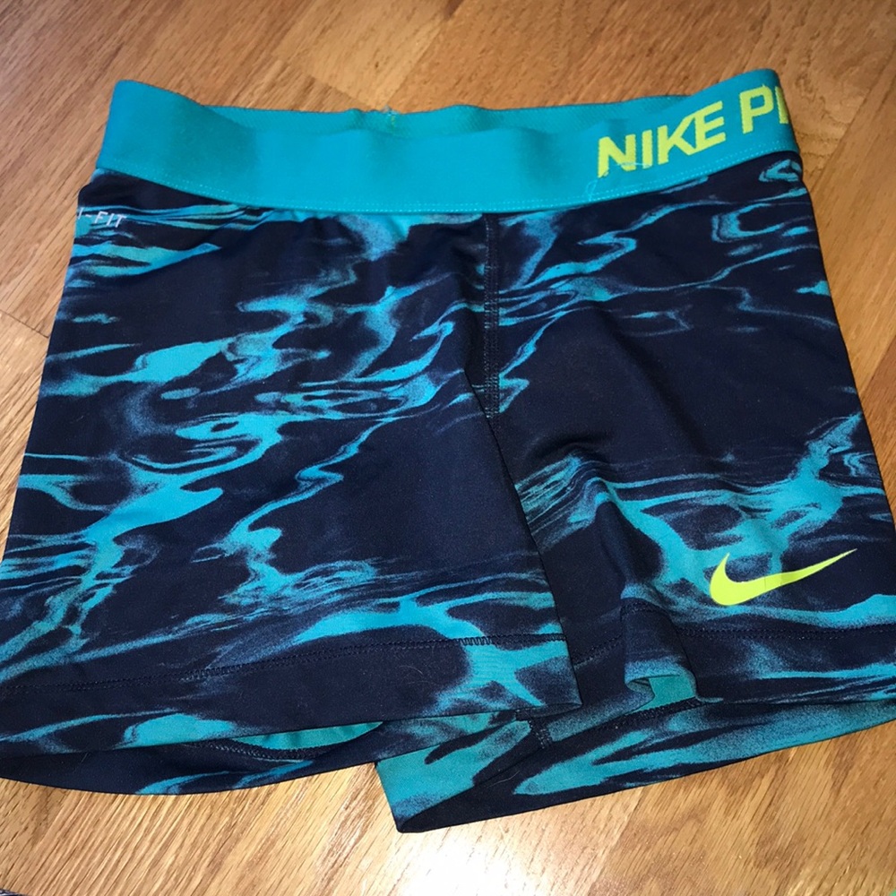 Teal and blue nike pros. Excellent condition